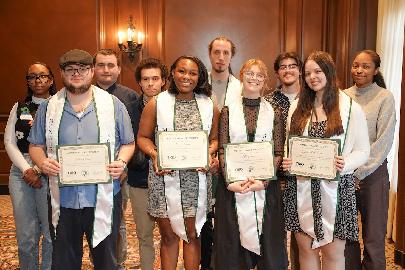 Scholars Holding Certificates during end of year Celebration