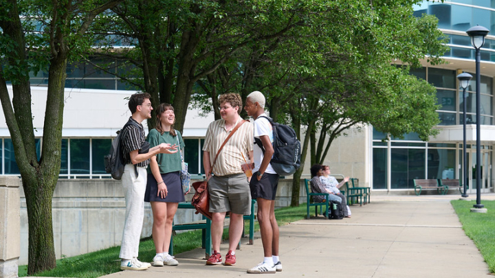 Students standing in front of Levin.